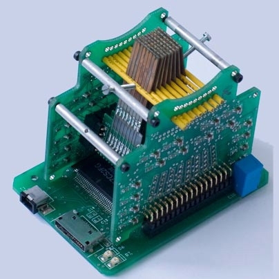This stimulator was used in a study to show that how humans feel the world can actually change how they see it -- and vice versa. The device consists of a centimeter-square array composed of 60 pins to deliver precisely controlled vibrations to the fingertips.