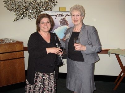 Maria C. Puerta and Eve Odiorne Sullivan, friends from long ago, reunite as new Quarter Century Club members.
