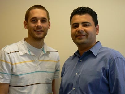 Daniel George, left, and Ghassan Awwad both 2009 graduates of the Leaders for Manufacturing Program, comprised the first-place team for the 5th Annual Operations Simulation Competition co-sponsored by MIT Sloan and GM.