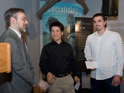Department of Electrical Engineering and Computer Science Associate Department Head Duane Boning presents the George C. Newton project prize -- 6.111 to Tony Kim (Hyun) and Nevada Sanchez for video acquisition multi-touch controller.