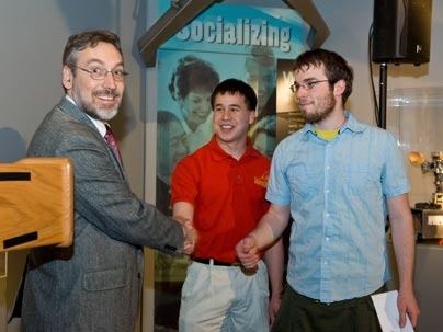 Department of Electrical Engineering and Computer Science Associate Department Head Duane Boning presents the Northern TelecomBNR 6.111 project to Tao Benjamin Schardl and Nicholas Harrington for voice recognition in hardware.