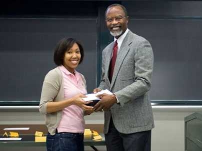 Chancellor Phillip L. Clay with one of the Albert G. Hill Prize recipients Kristin Rose '10.