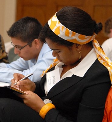 Janelle Fouche '11 and Orlando Saldivar '11  complete self-assessment exercises at the community Catalyst kick-off event. 