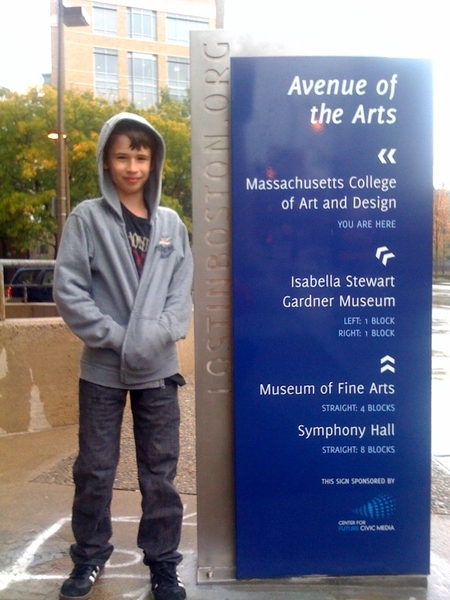 The first "Lost in Boston" sign, intended to more easily guide people around the city. This sign is located near the Massachusetts College of Art and Design.
