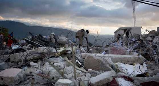 Days after the earthquake, Haitians continued to search through the rubble for any sign of life.  Petionville, Port-au-Prince.