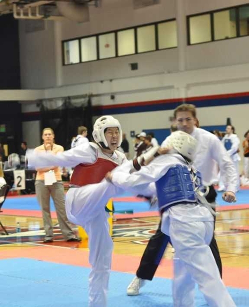 Freshman Tiffany Chen kicks her way to a bronze medal in the green belt featherweight sparring division.