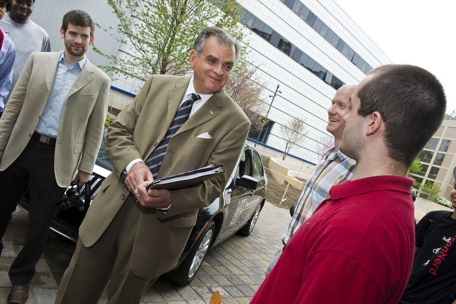 During a visit to MIT on Monday, May 3, U.S. Transportation Secretary Ray LaHood asked MIT students to help solve the problem of distracted driving. Here, LaHood meets with student members of the MIT Electric Vehicle Team, from left to right, Stephen Zoepf, Lennon Rodgers and Radu Gogoana.