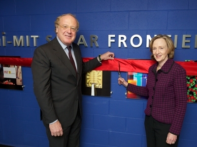 Paolo Scaroni, left, CEO of the Italian energy company Eni, and MIT President Susan Hockfield cut the ribbon to celebrate the opening of the Eni-MIT Solar Frontiers Center (SFC), headquartered on the MIT campus.