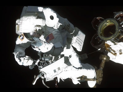 Astronaut and MIT alumnus Robert L. Satcher Jr. '86, PhD '93, STS-129 mission specialist, participates in a spacewalk.