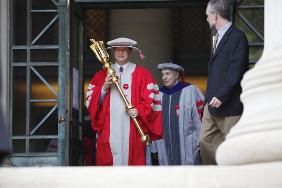 MIT Alumni Association President Kenneth Wang, president of U.S. Summit Company, leads the Institute delegation into the Commencement ceremony.
