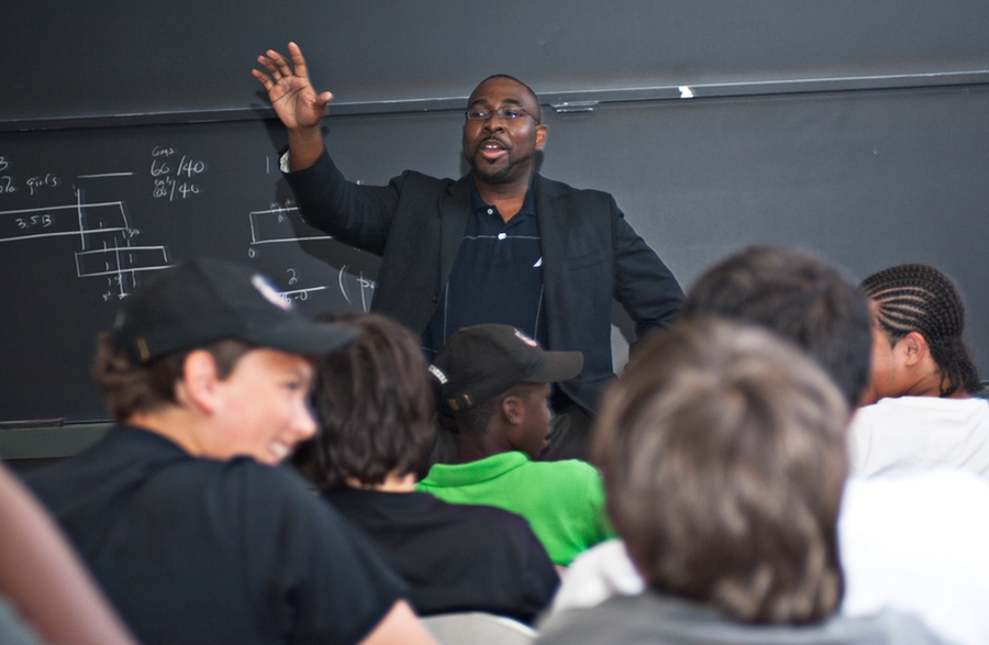 Dedric Carter, assistant dean for development and strategic initiatives in the MIT School of Engineering, shows the students how to apply what they learn in engineering classes to issues in their lives. Carter, the former director of the program, encouraged the boys to work hard in school, to set goals and to be curious and ask questions.