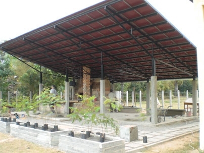Team members finish building the vault that is at the core of the kitchen. A few days later, the school children were served their first meal in the new kitchen.