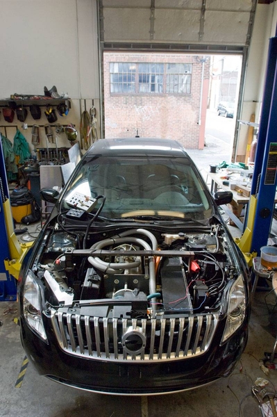 A view of the converted Mercury Milan (donated by Ford Motor Company) that the team has converted as an electric vehicle suitable for rapid recharging.