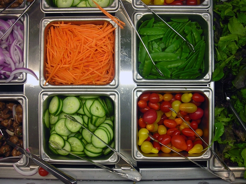 The 100 Main Marketplace features a large, central salad bar.