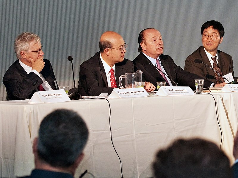 At the 25th-anniversary conference of MIT’s Center for Real Estate, members of a panel on “Financial Re-Engineering” included (from left): Bengt Holmstrom, the Paul A. Samuelson Professor of Economics; Andrew Lo, director of the Laboratory for Financial Engineering at the MIT Sloan School of Management; Robert C. Merton, School of Management Distinguished Professor of Finance; and Jiang Wang...
