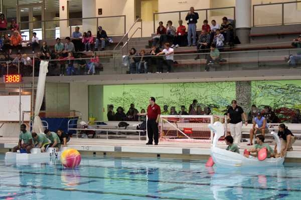 Hands on. Crews and boats prepare for the start of the fourth-annual Head of the Zesiger Cardboard Regatta on Oct. 16.