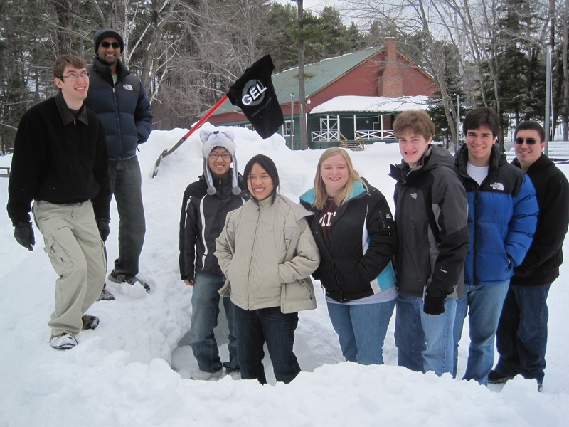 Gordon Engineering Leaders pose outside of their quinzee shelter. This is one of the team-building exercises that took place during their short course, "Project Engineering," from Jan. 27-30 at Camp Cody, N.H.