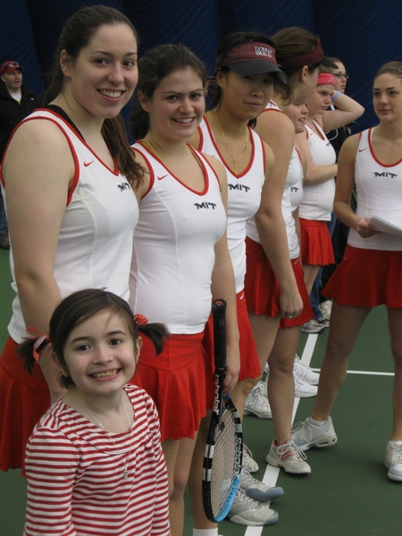 Before a match, Caroline joins the team lineup including Leslie Hansen(left), Anastasia Vishnevetsky, and Yi Wang.