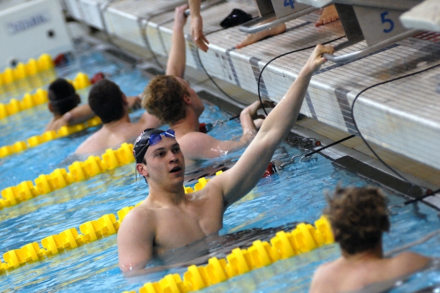 Wyatt Ubellacker '13, after winning the 100 Fly - and setting a NEWMAC meet record. Ubellacker placed first and earned NCAA "B" cuts in the 50 freestyle, 400 medley relay, 200 medley relay, 100 butterfly, and 400 freestyle relay, while also captured third place in the 100 freestyle for his sixth NCAA provisional qualification.
