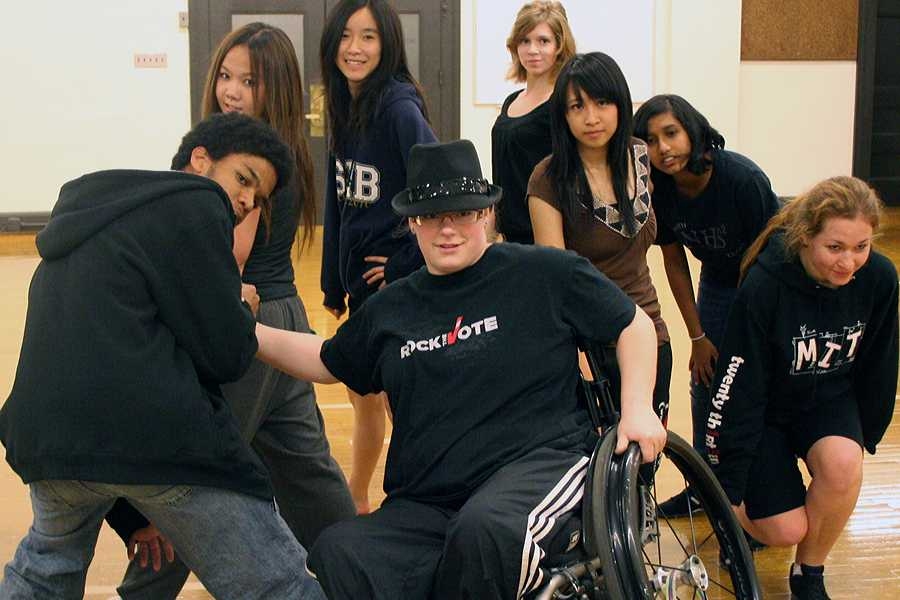 Students in the hip-hop course strike a pose at the end of the routine.