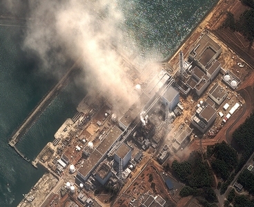 An image from DigitalGlobal showing smoke coming from the Fukushima nuclear power plant on Monday.