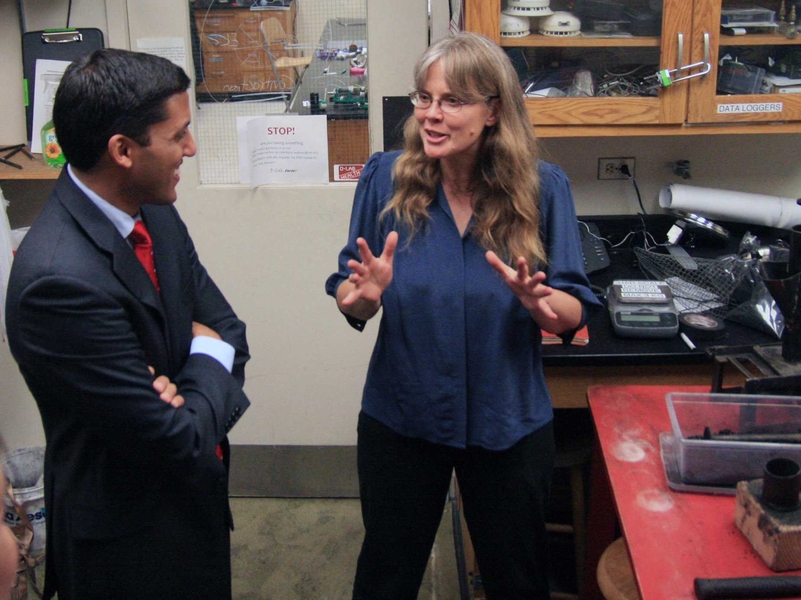 Smith, a senior lecturer at MIT, explains the innovations in international development happening at MIT to Shah.