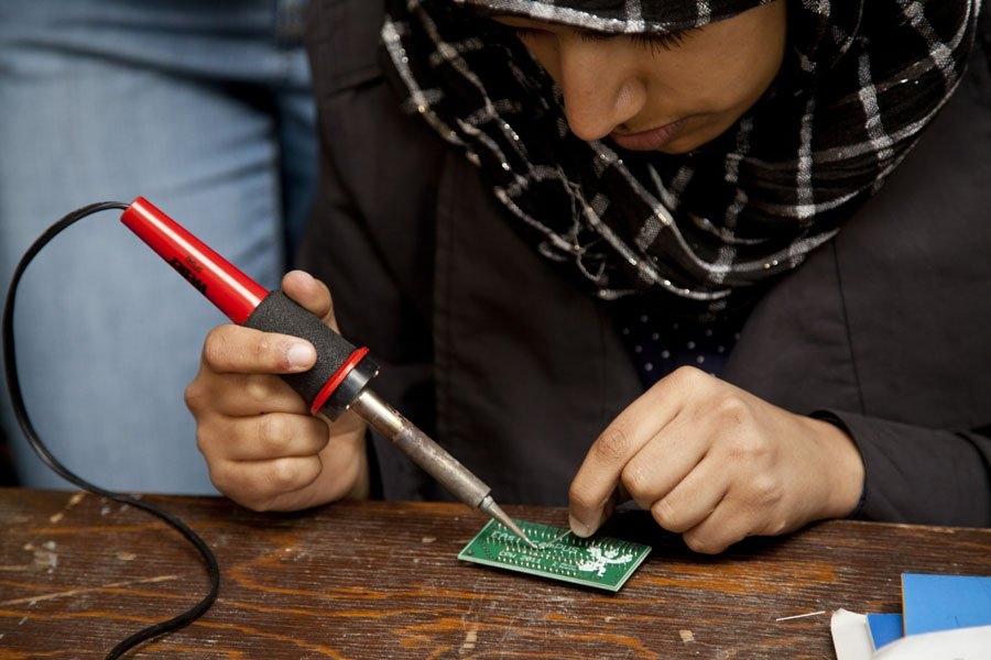 Prospective students learned how to solder a circuit board in the Talbot Lounge at East Campus - and they even got to keep the circuit they soldered. Nearly every dorm hosted activities and events from morning to night.