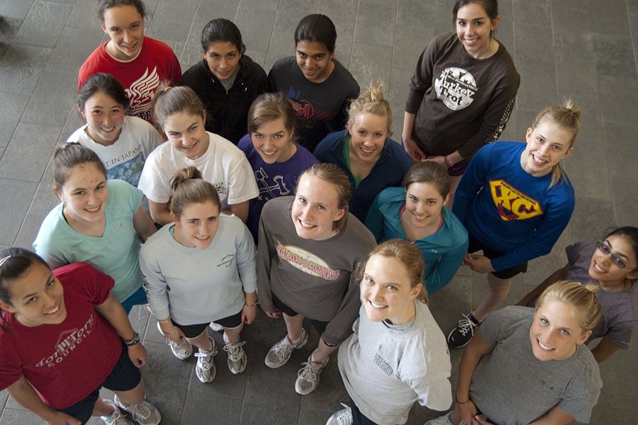 Prefrosh and undergraduates from the MIT track & field team meet up in the Zesiger Center lobby before taking a run along the Charles River.
