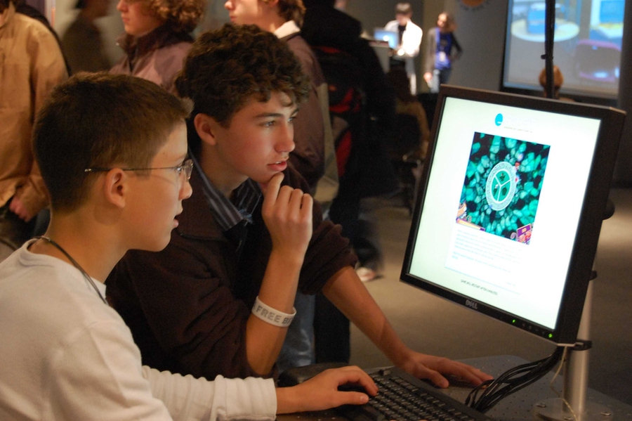 Visitors to the MIT Museum play a game developed by CMS's GAMBIT Game Lab.