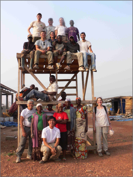 Workers at the new factory pose with members of the MIT team. MIT senior lecturer Susan Murcott, at right, set up the nonprofit company Pure Home Water to produce the filters.