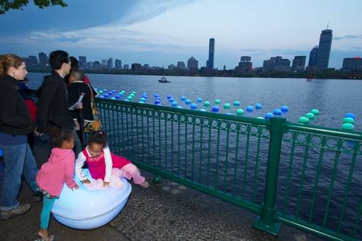 Participants interacting with 'Light Drift' by Meejin Yoon.