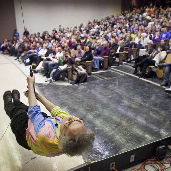 Lewin Swings back and forth on the pendulum.