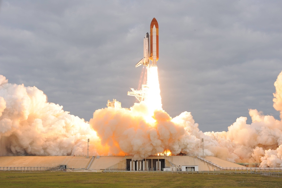 Launch of space shuttle Endeavour from the Kennedy Space Center with the Alpha Magnetic Spectrometer experiment onboard.