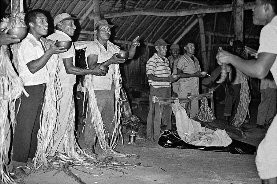 In one episode, men chant and drink while weaving the ropes for a ritualist’s hammock.
