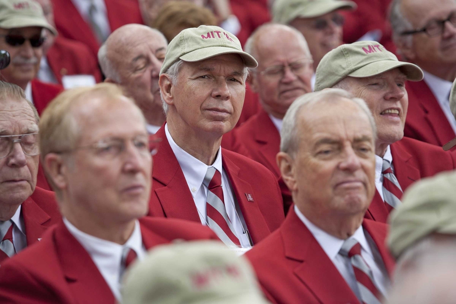 Alumni who reach their 50th anniversary are given Red Coats to wear; many attended Friday's ceremonies.