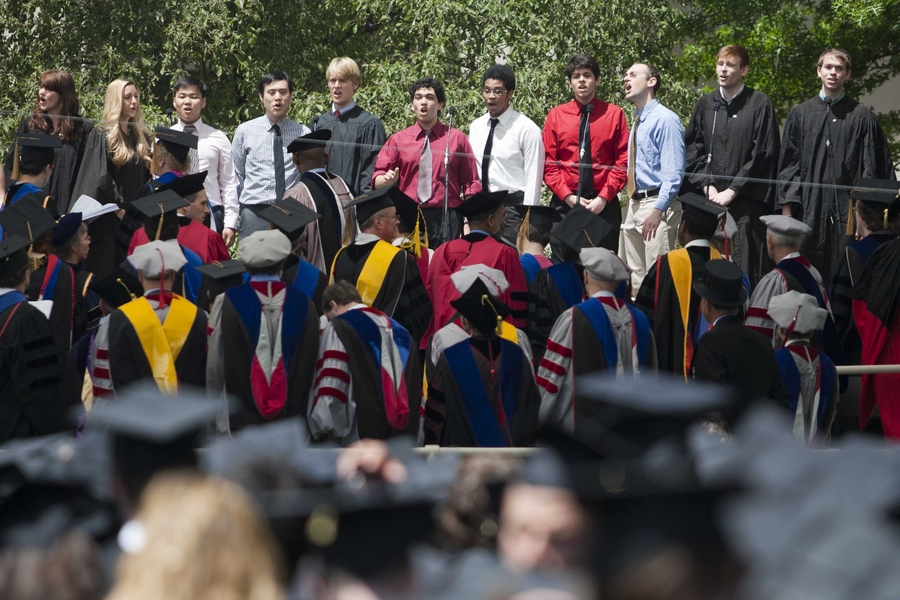 The Chorallaries, an MIT a cappella group, perform as part of Friday's ceremony.