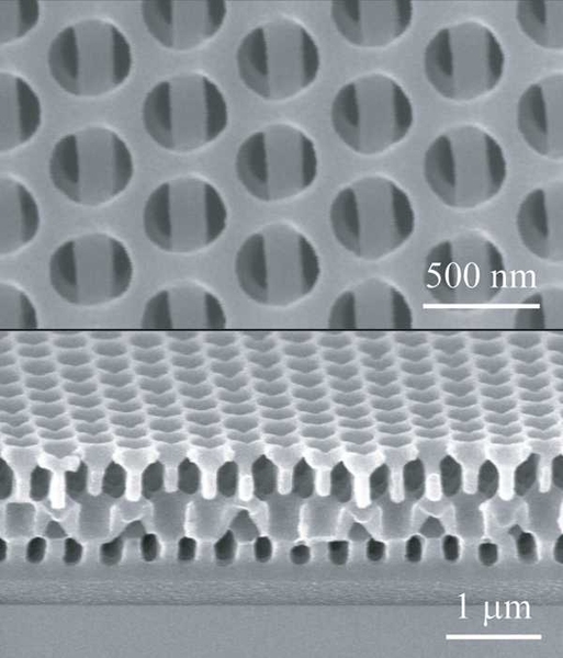 The new 3D nanofabrication method makes it possible to manufacture complex multi-layered solids all in one step. In this example, seen in these Scanning Electron Microscope images, a view from above (at top) shows alternating layers containing round holes and long bars. As seen from the side (lower image), the alternating shapes repeat through several layers.