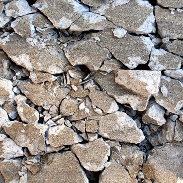 Pieces of cracked cement in tessellation