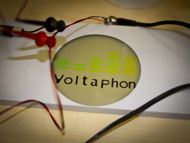 The Voltaphon team designed a system to generate electricity from sound waves by creating resonant cavities that amplify certain frequencies of sound.