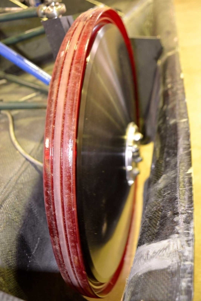 Red solid urethane tires, the product of a collaboration between SEVT and its sponsors Spracher Engineering, HSMWorks and TWT Group.