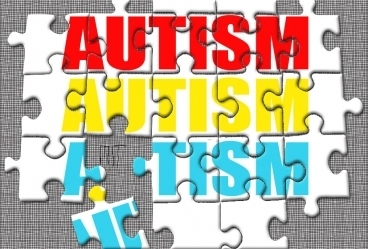 Jigsaw puzzle with the word "autism"