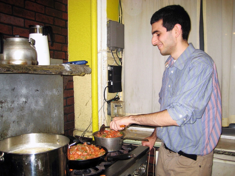 Benjamin Francis, and MIT junior, prepares dinner at the soup kitchen he started to help the homeless.