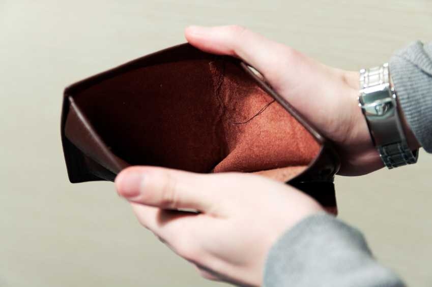hands holding open an empty wallet