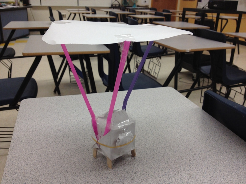 As a part of a lesson on gravity, students at Navajo Middle School built contraptions such as this one to protect their eggs from breaking when dropped from the top of the school bleachers.