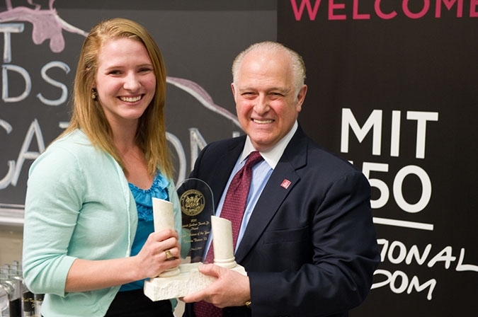Chris Colombo (Dean for Student Life) presents the Frederick Gardiner Fasset Greek Woman of the Year Award to Victoria Thomas ’12.