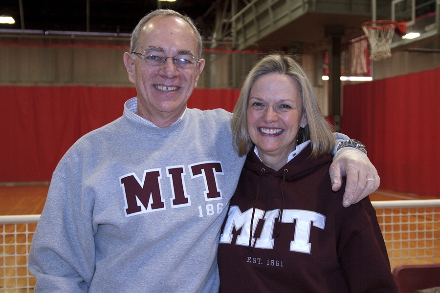 Provost Rafael Reif and his wife, Chris, served happy and hungry fans at the Dupont Athletic Gymnasium.
