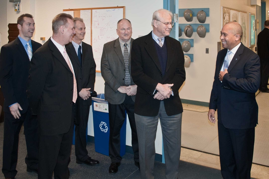 At the entrance to the Alcator C-Mod Control Room, Mass. Gov. Deval Patrick greets PSFC Director Miklos Porkolab, along with senior officers of the Research, Development, and Technical Employees Union.