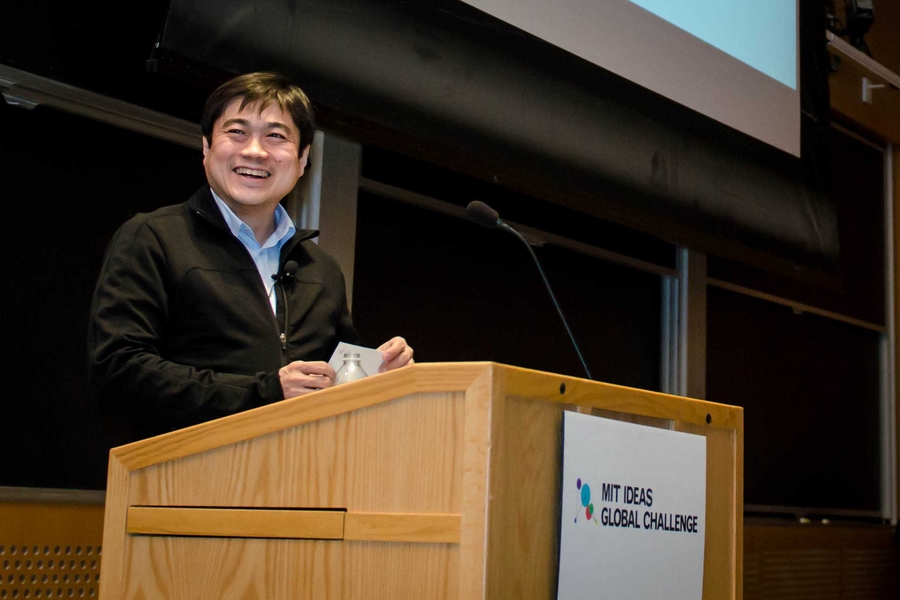 Joi Ito, director of the MIT Media Lab, welcomes the crowd and names the Community Choice Award winners at the IDEAS Global Challenge awards ceremony on Thursday, May 3.