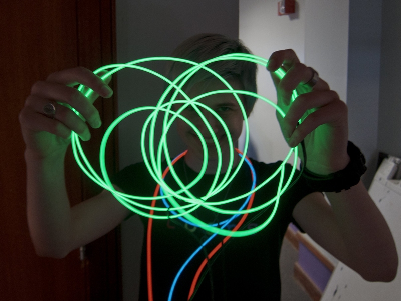 Pauline Varley &#39;15 shows off her electroluminescent wire (EL wire) in the East Campus dormitory, which often hosts construction, destruction and other hands-on activities.