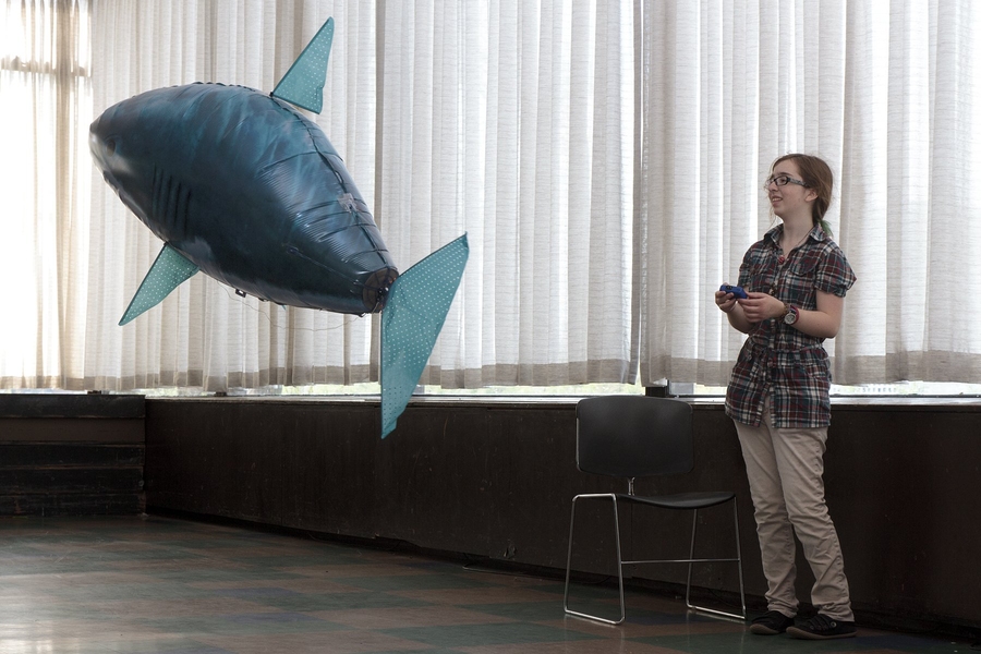 Prefrosh Megan Belzner of New Mexico tries out a fish blimp at Burton-Conner, an undergraduate dormitory. Each dormitory hosted quirky and fun activities and social events to show off its unique culture.